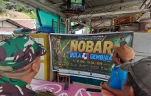 Babinsa Lempake Gelar Nobar Bola Gembira Piala Dunia 2026 Bersama Warga